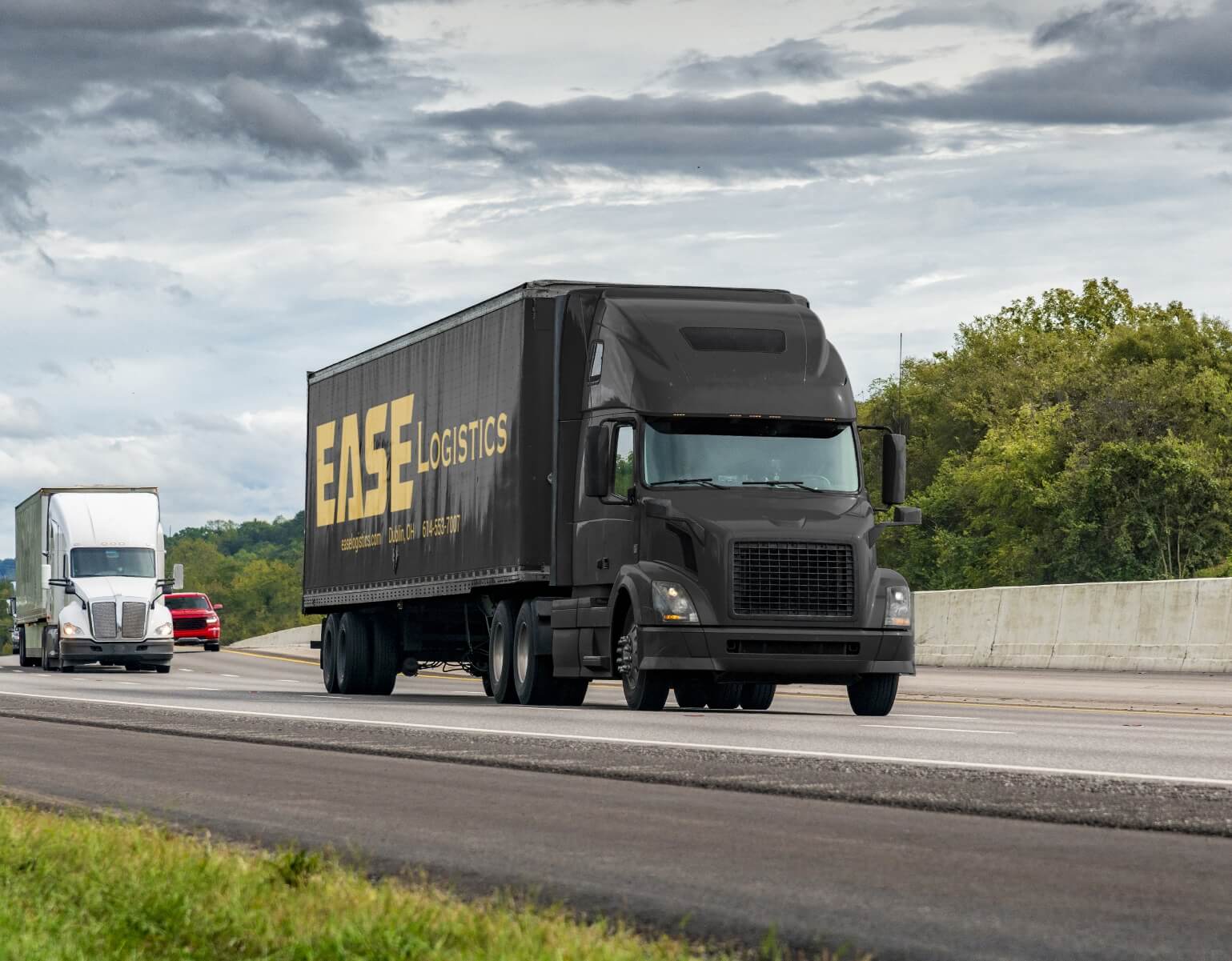 Black FTL truck with EASE Logistics logo